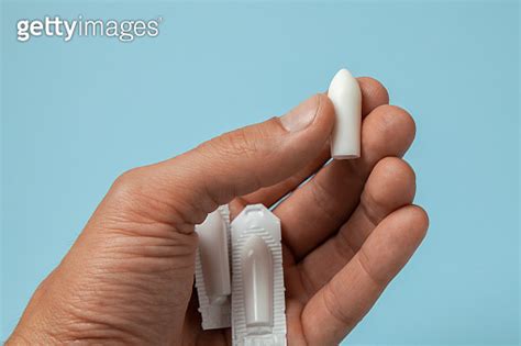 Suppository For Anal Or Vaginal Use In The Hands Of A Man Candles For