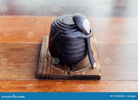 Japanese Caramel Pudding Served in Black Ceramic Cup Stock Photo - Image of cuisine, cook: 129384496