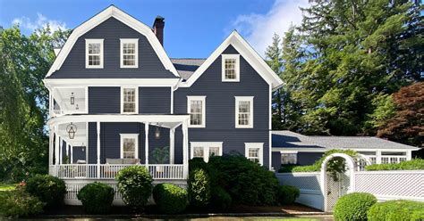 Stylish and Timeless: Navy Blue House Black Shutters - See Photos!