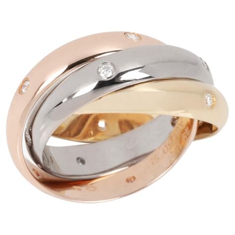 Cartier Ct White Gold Yellow Gold And Rose Gold Medium Trinity Ring