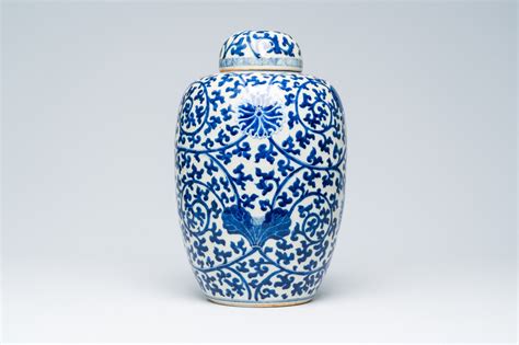 A Chinese Blue And White Crackle Glazed Lotus Scrolls Jar And Cover