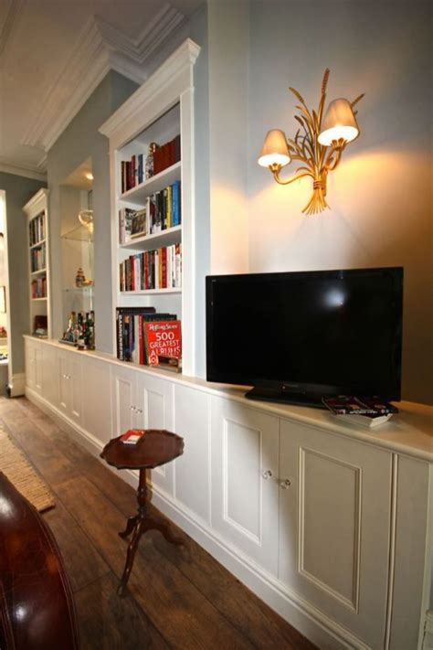 Custom Built Bookcase With Cabinets Below In Wandsworth Living Room