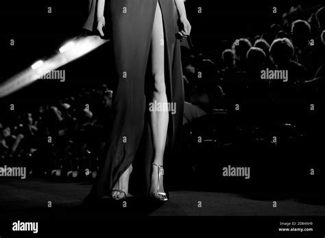 Fashion model on a runway during the fashion show. Woman legs Stock ...