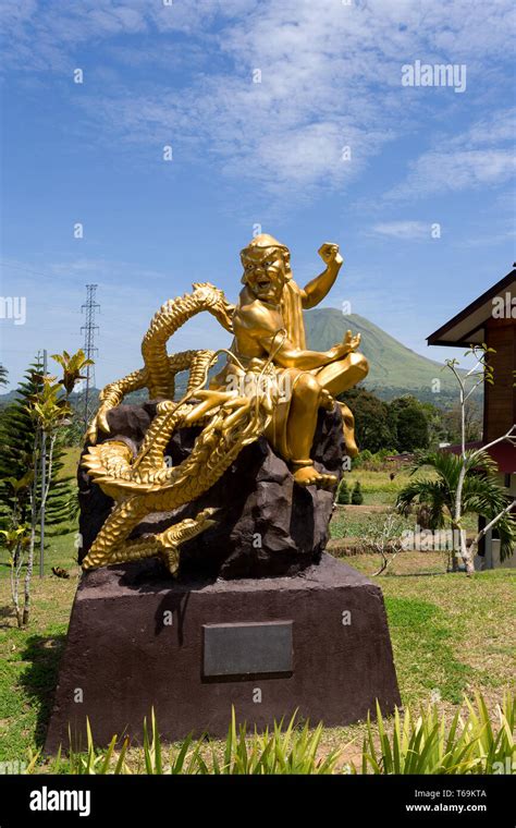 fat monk statue in complex Pagoda Ekayana Stock Photo - Alamy