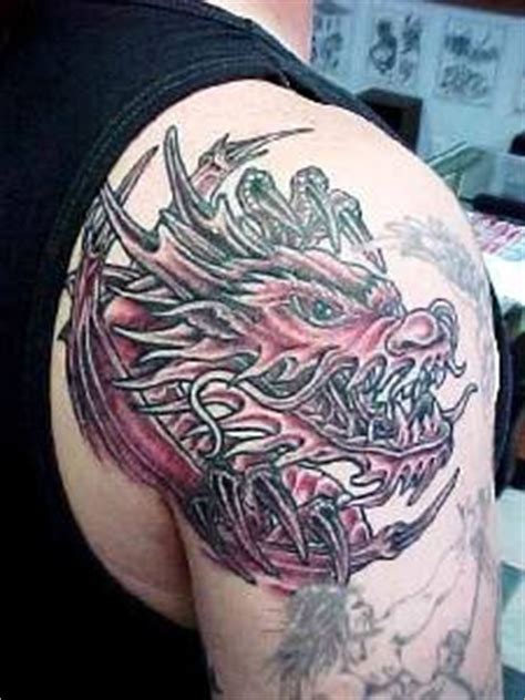 Angry dragon head tattoo - Tattooimages.biz