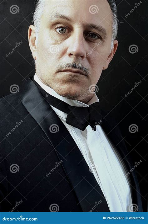 Vertical Portrait Of An Adult Caucasian Man In A Tuxedo An Italian