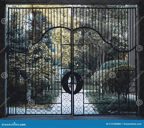 A Black Gate is Shown with an Ornate Design on it Stock Photo - Image ...