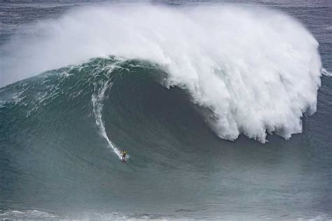 Justine Wins Nazaré Tow Surfing Challenge - SurfGirl Magazine