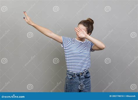 Woman Standing in Dab Dance Pose, Internet Meme, Celebrating Success. Stock Photo - Image of ...