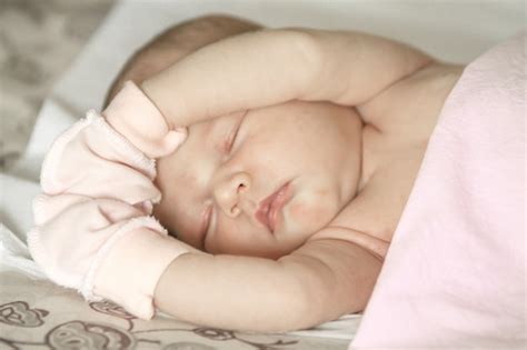 Premium Photo Sleeping Naked Newborn Baby Girl On A White Blanket