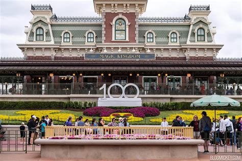 Disney100 Sign Replaces 50th Anniversary Sign At Magic Kingdom Entrance