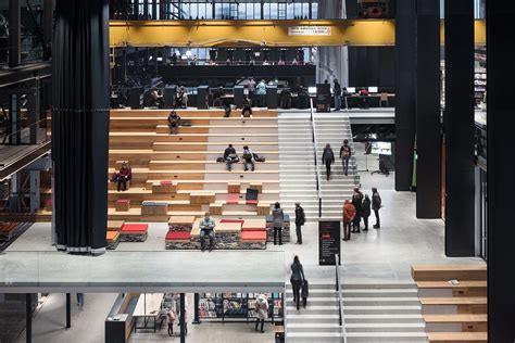 Civic Architects transforms old industrial building into a transparent public library in Tilburg