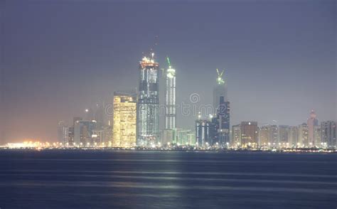 Abu Dhabi Skyline at night stock image. Image of skyscrapers - 13267581