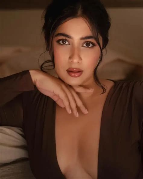 Hot Nikita Sharma Shows Off Big Boobs And Curvy Figure In Low Neck Monokini