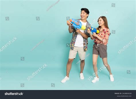 Happy Asian Water Gun Over Royalty Free Licensable Stock Photos