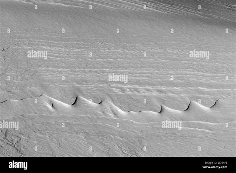 Structures On An Ice Edge In The Snow In The Form Of A Mountain Range