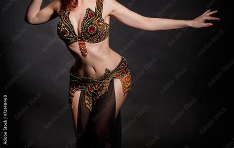 Arabian belly dancer sexy woman dancing bellydance ภาพถายสตอก Adobe