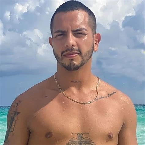 Antuan Is Enjoying The Blue Sea Under The Hot Cancun Sun While The Cameraman Films Him