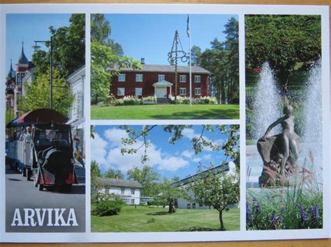 an open book with pictures of buildings and water spouting from it's center