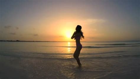 Chinese Girl In Bikini Dancing On Beach Stock Video Spotmatik 101645274