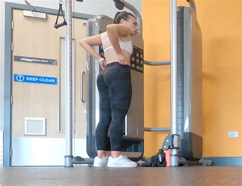 Gym Brunette In Tight Black Camo Leggings Bending Over Part Spandex Leggings Yoga Pants