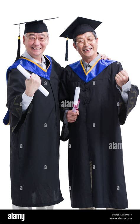 Senior students cheering for graduation Stock Photo - Alamy