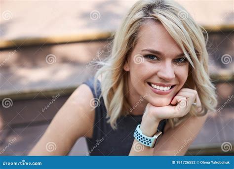 Portrait Of Beautiful Young Woman Expressing Joy With Her Smile Stock