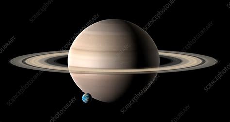 Earth compared to Saturn, illustration - Stock Image - F021/1719 ...