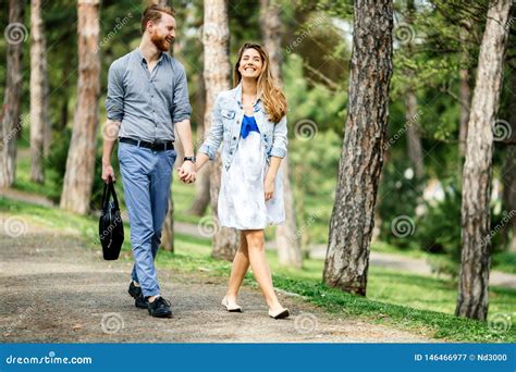 Beautiful Couple Taking A Walk In City Park Stock Image Image Of