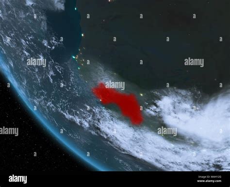 Guinea En La Noche Resaltada En Rojo En El Planeta Tierra Con Nubes