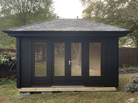 M X M Hipped Roof Log Cabin Garden Room Philipson Log Cabins