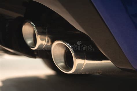 Close Up 0f a Car Dual Exhaust Pipe. Stock Photo - Image of double ...