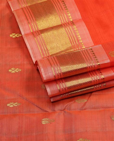 Dark Orange Kancheepuram Silksaree With Zari Buttas Contrast One Side