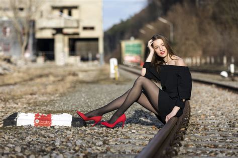 Bokeh Brunette Girl Sitting Rails Hands Dress Legs Stilettos