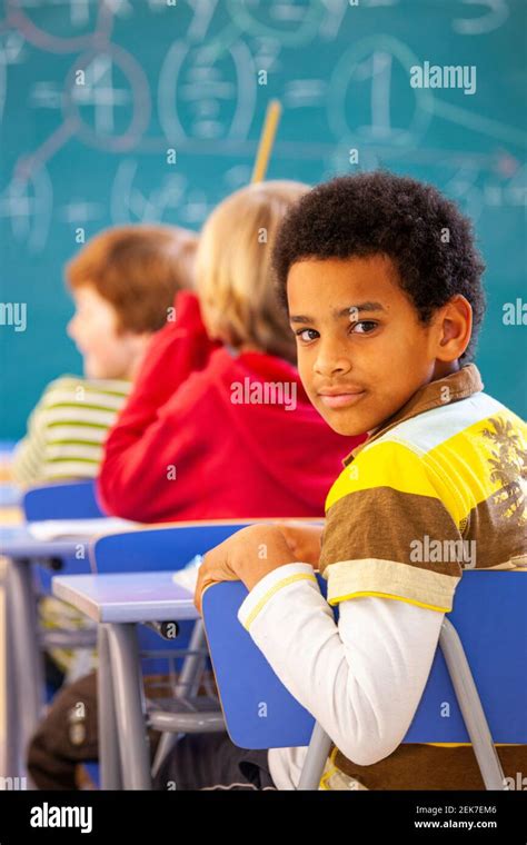 Children Studying Mathematics In An Elementary School Classroom Stock