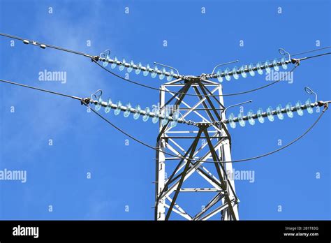 Isolated Top Of Electricity Pylon Showing Insulating Cables Bypass