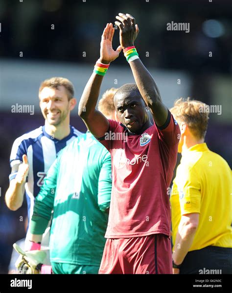 Newcastle United's Papiss Cisse applauds the travelling fans after the ...