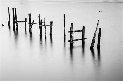 Premium Photo Abandoned Jetty At Sea