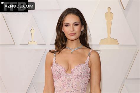 Lily James Sexy Seen Flaunting Her Hot Tits At The Annual Academy