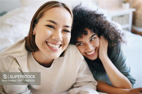 Love Happy And Portrait Of Lesbian Couple Relaxing On Bed For Bonding Together On A Weekend