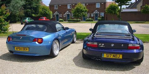 Bmw Z4 And Z3 Rear View The Z3 Dark Blue Is A 1999 Version With A