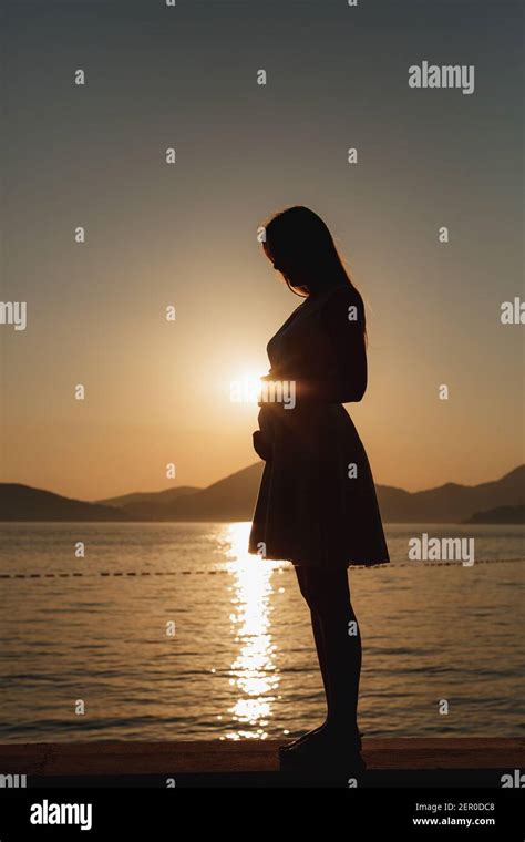 Beach Sunset Maternity Pregnancy Pregnant Silhouette Hi Res Stock