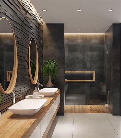 A Modern Bathroom With Two Sinks And Large Mirrors On The Wall Next To