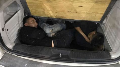 Border Agents Find Mexican Nationals Being Smuggled Into Us Under Van Floorboard Car Trunk