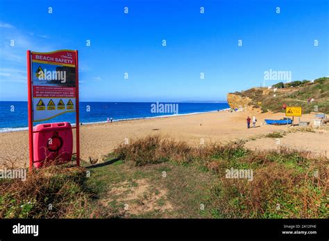 Hive Beach Warning Signs Near West Bay Coast Resort Jurassic Coast Crumbling Sandstone Cliffs