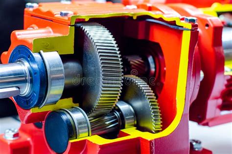 Close Up Of Cross Section Helical Gearbox With Motor Stock Photo