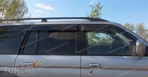 Ветровики Митсубиси Паджеро Спорт 1 (дефлекторы окон Mitsubishi Pajero ...