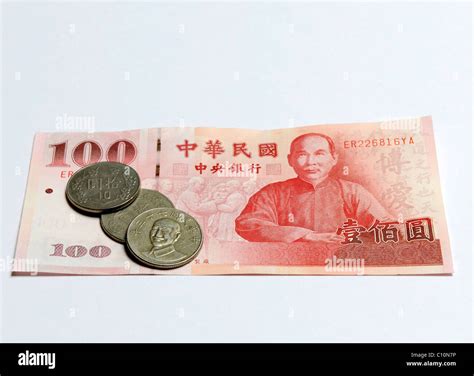 Taiwan dollar banknote and coins Stock Photo - Alamy