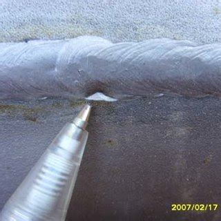 Weld crater in the weld bead. Figure 10-Crack in the weld bead ...