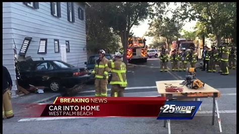 Car Slams Into Home